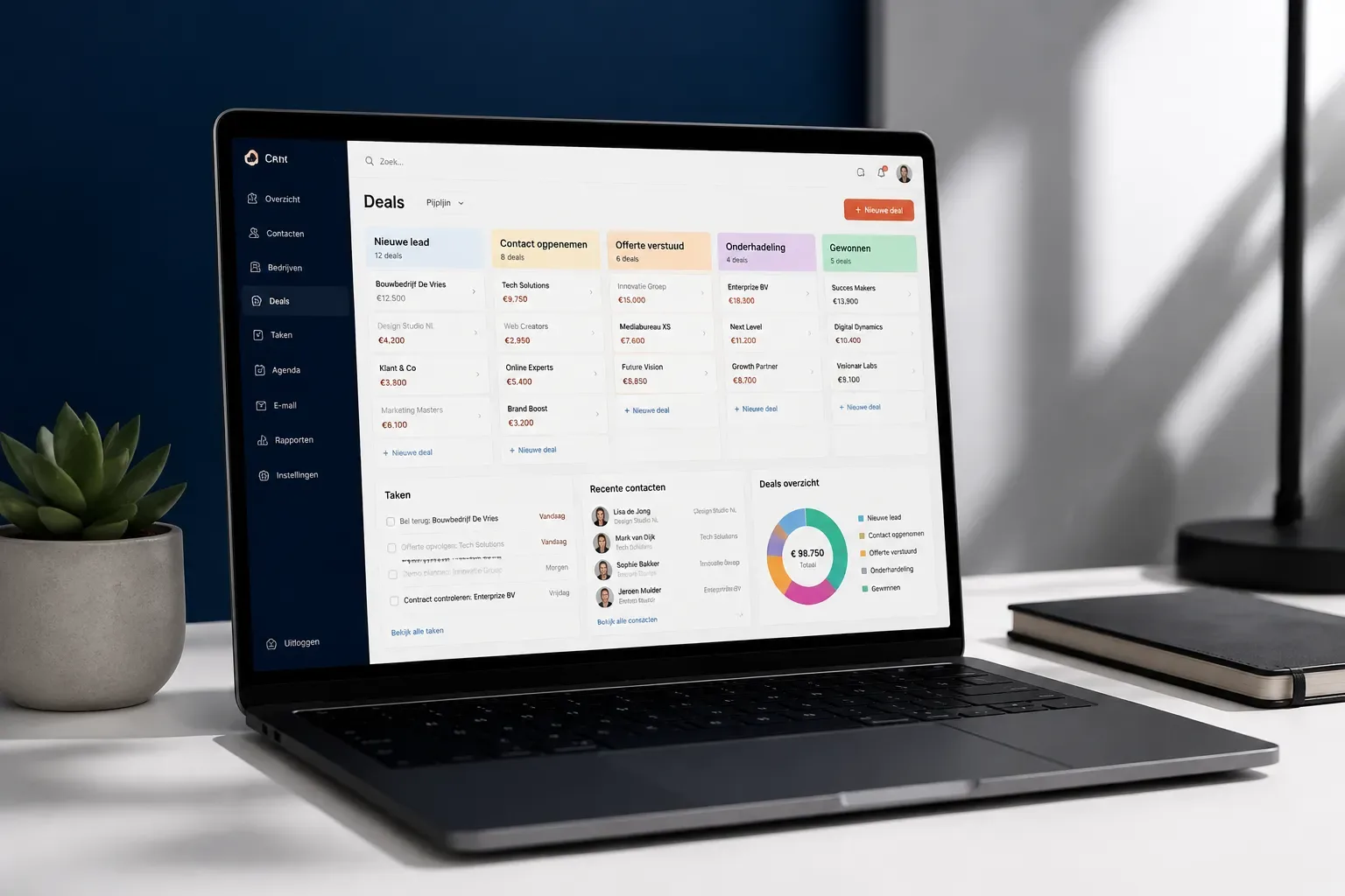Studio product hero shot of a sleek laptop displaying a clean CRM dashboard interface with colorful pipeline cards and